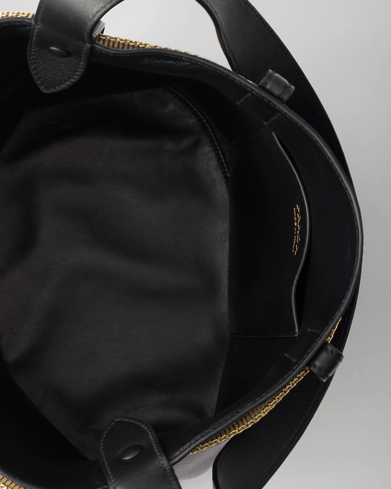 Prada Buckle leather bucket bag with jeweled belt