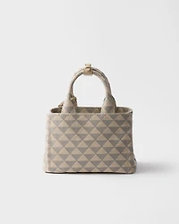 Small embroidered fabric handbag