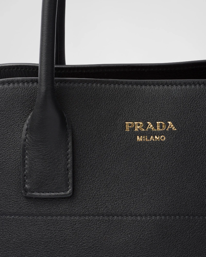 Large leather tote bag with buckles