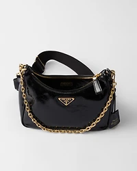 Prada Re-Edition 2005 naplak patent leather bag with charm