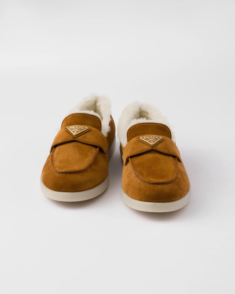 Suede and shearling loafers