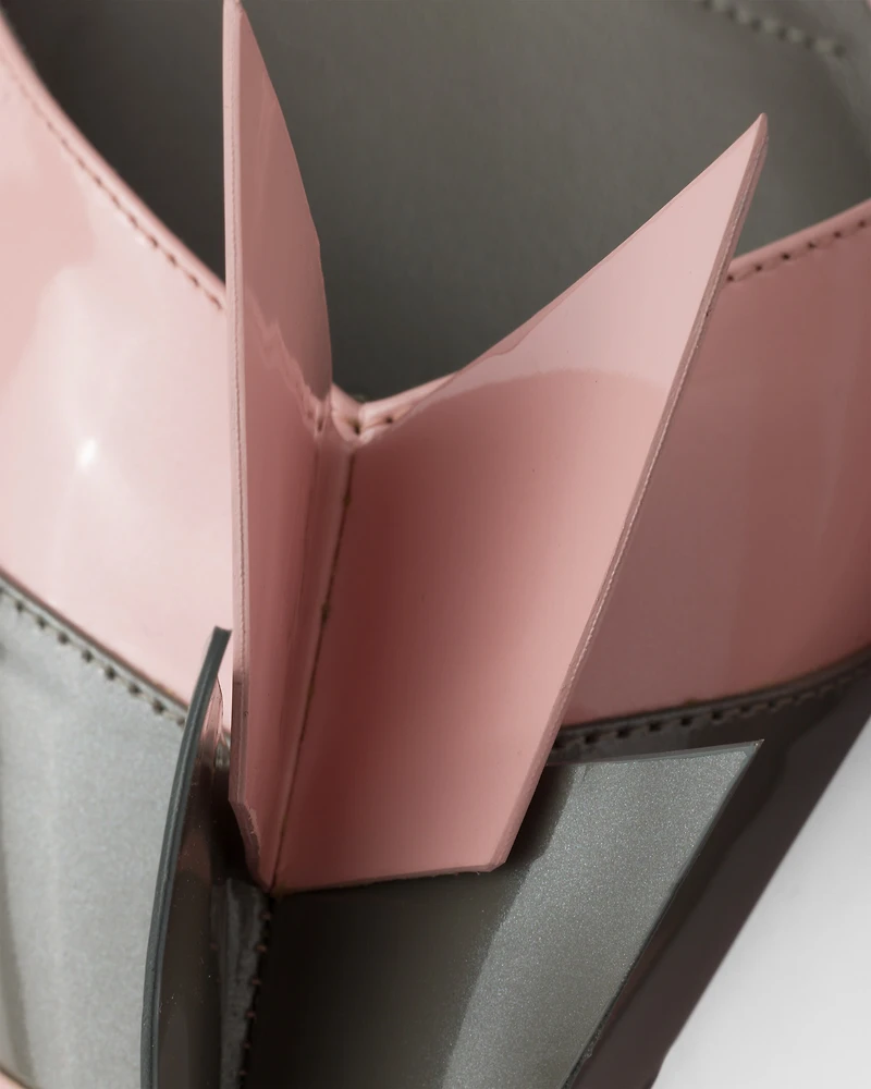 Two-tone patent leather D'Orsay pumps