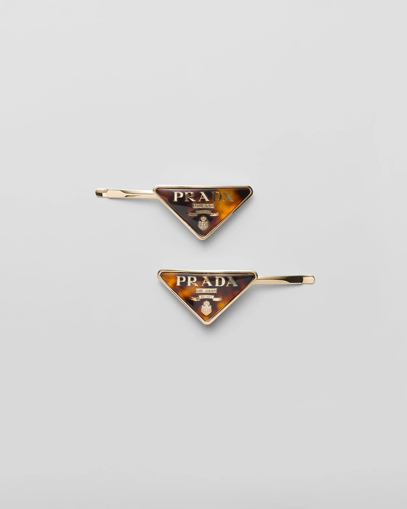 Plexiglas and metal barrette
