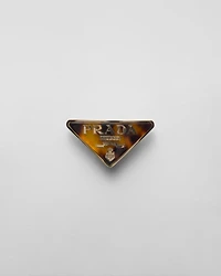 Plexiglas and metal hair clip