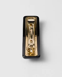 Plexiglas and metal hair clip