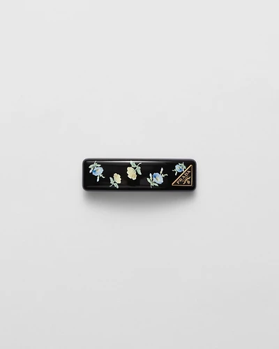 Plexiglas and metal hair clip