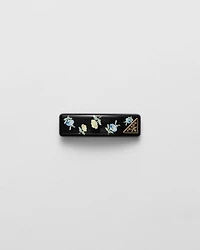 Plexiglas and metal hair clip
