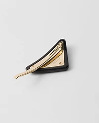 Plexiglas and metal hair barrettes