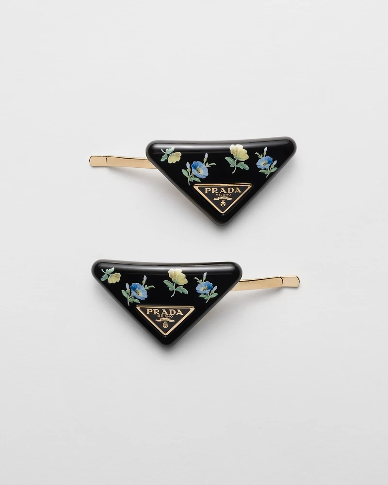 Plexiglas and metal hair barrettes