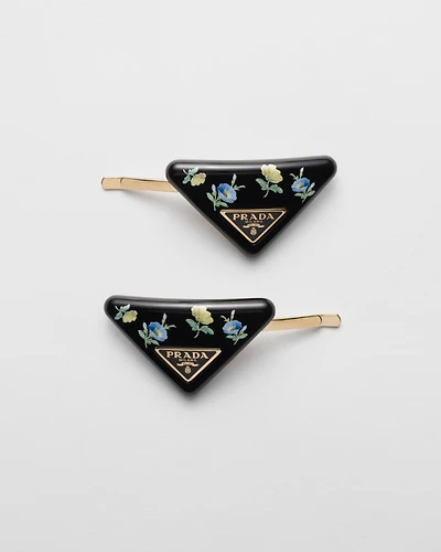 Plexiglas and metal hair barrettes