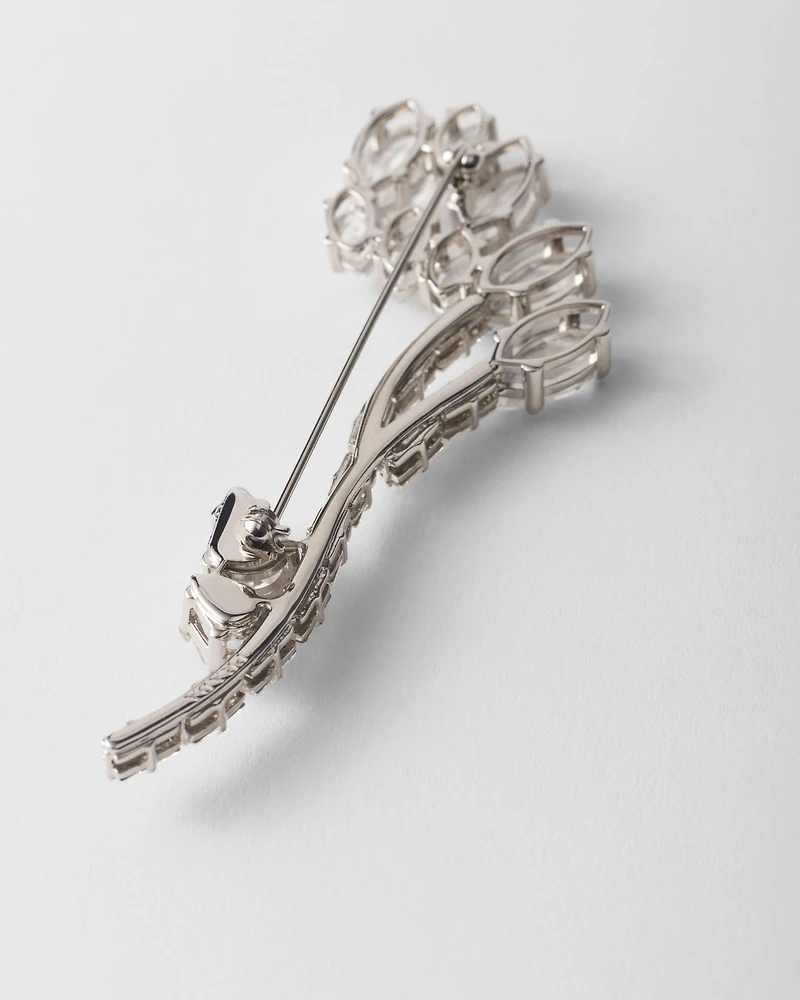 Metal brooch with crystals
