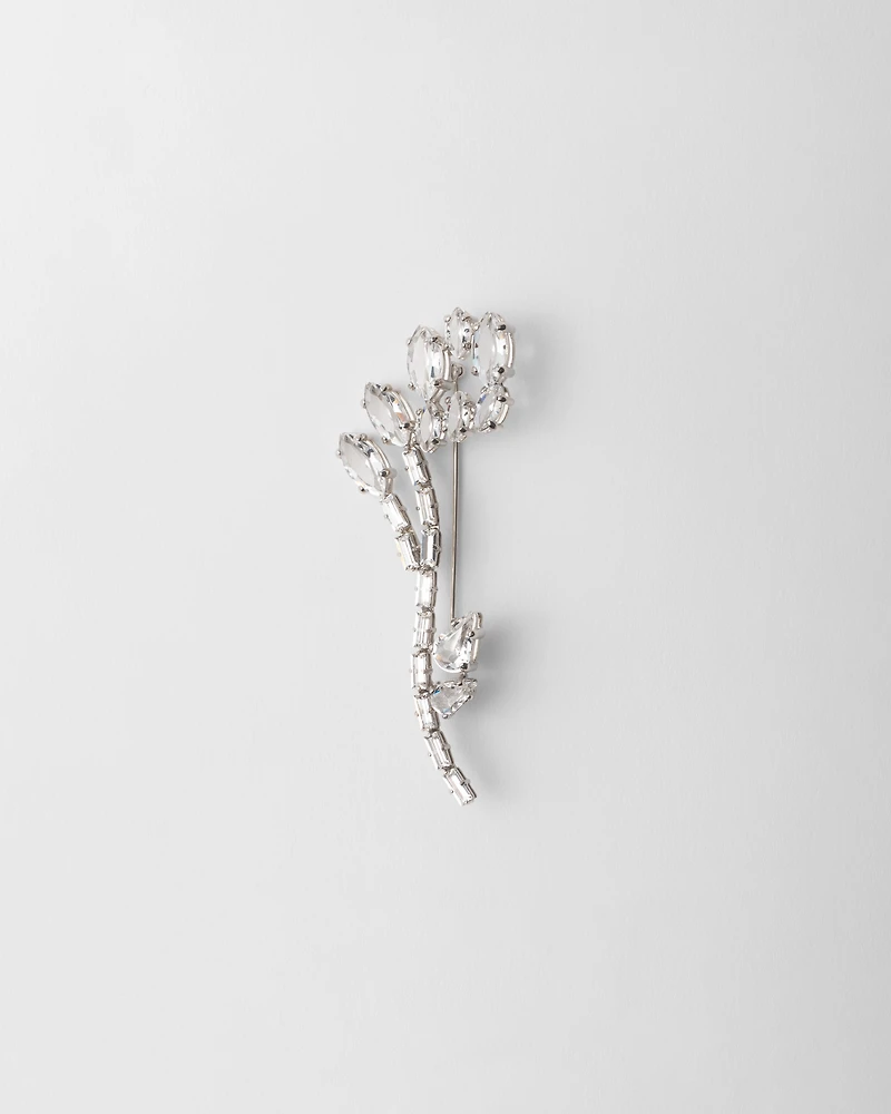 Metal brooch with crystals