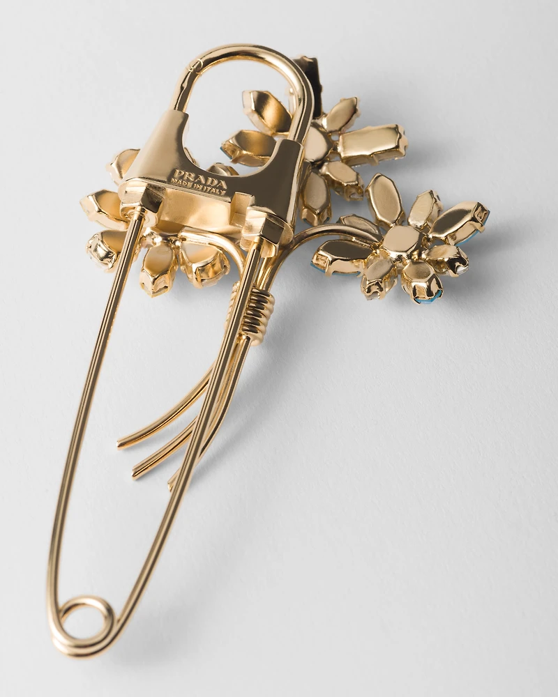 Metal brooch with crystals