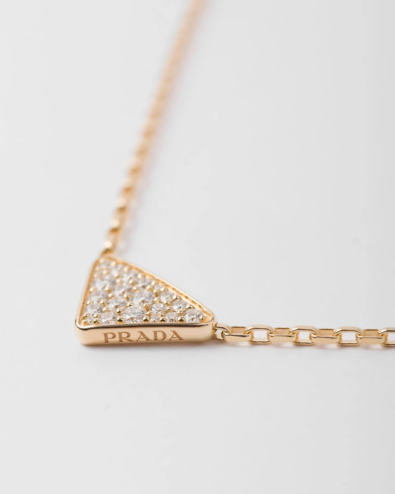 Eternal Gold micro triangle pendant necklace in yellow gold and diamonds 