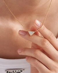 Eternal Gold micro triangle pendant necklace in yellow gold and diamonds 