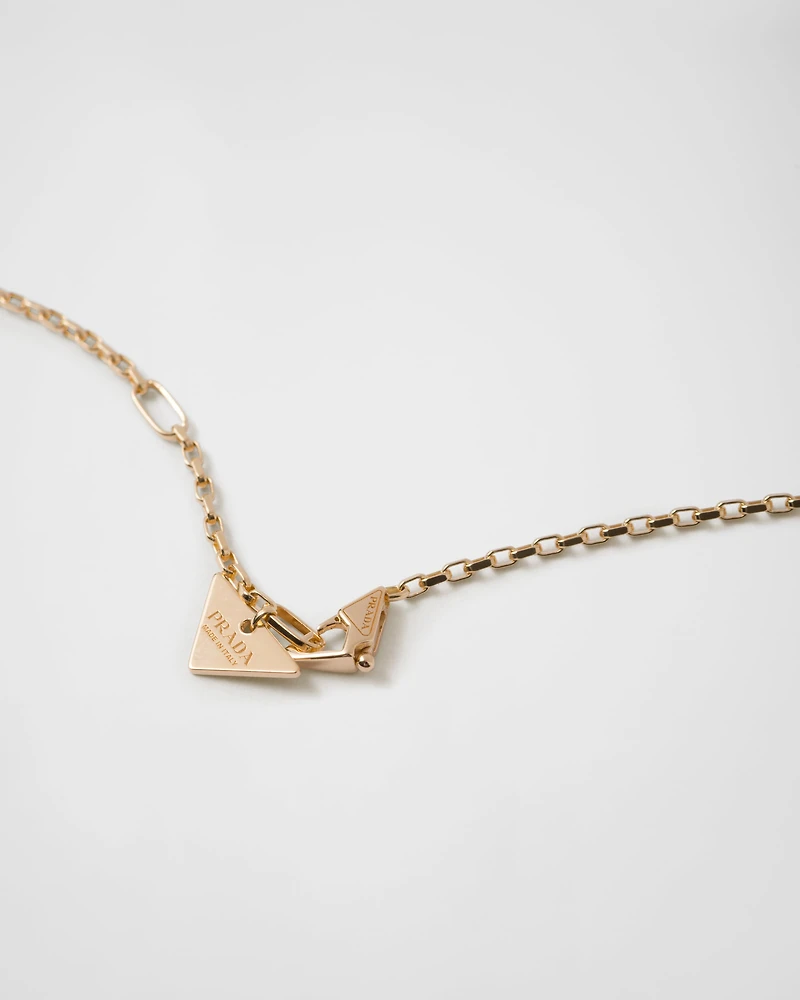 Eternal Gold micro triangle pendant necklace in yellow gold and diamonds 
