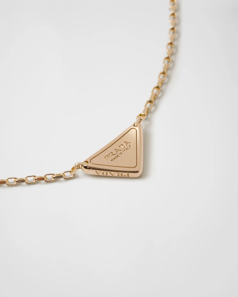 Eternal Gold micro triangle pendant necklace in yellow gold and diamonds 