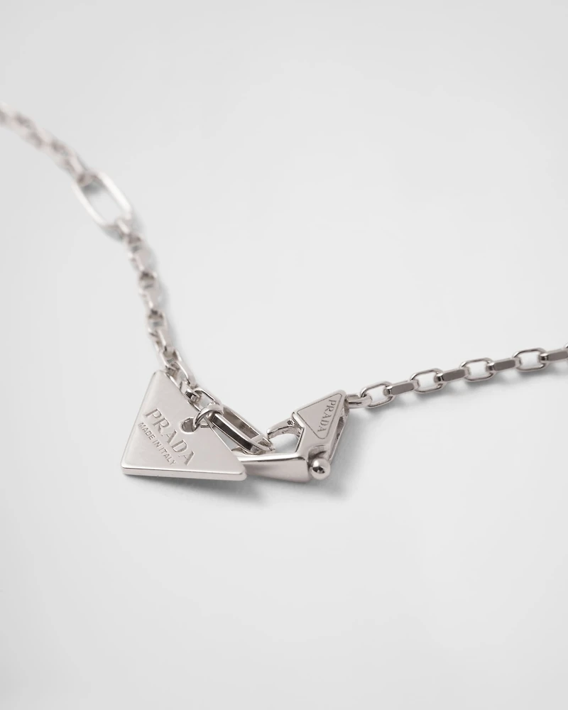 Eternal Gold micro triangle pendant necklace in white gold and diamonds