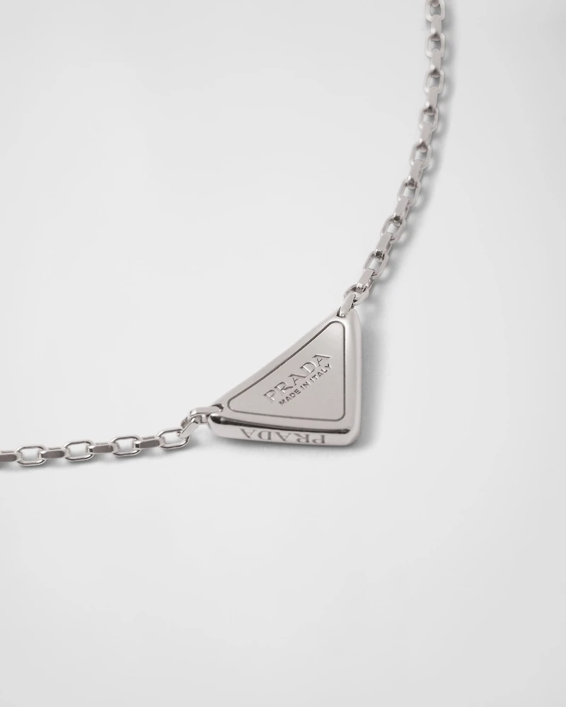 Eternal Gold micro triangle pendant necklace in white gold and diamonds
