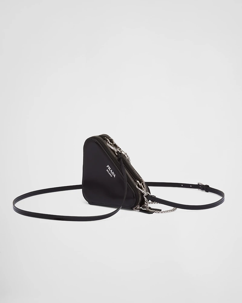 Triangular embellished satin and leather mini-pouch