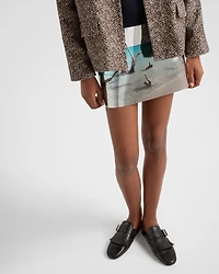 Shuffle fringed leather mules