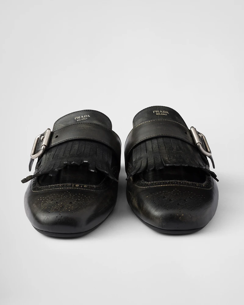 Shuffle fringed leather mules
