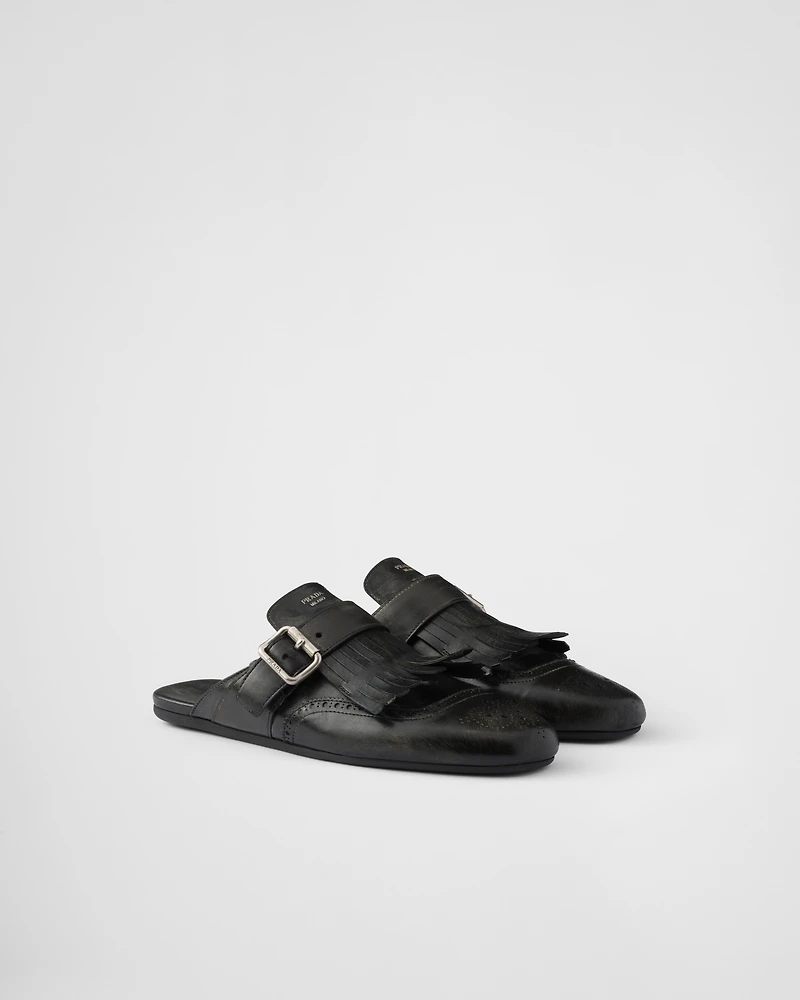 Shuffle fringed leather mules