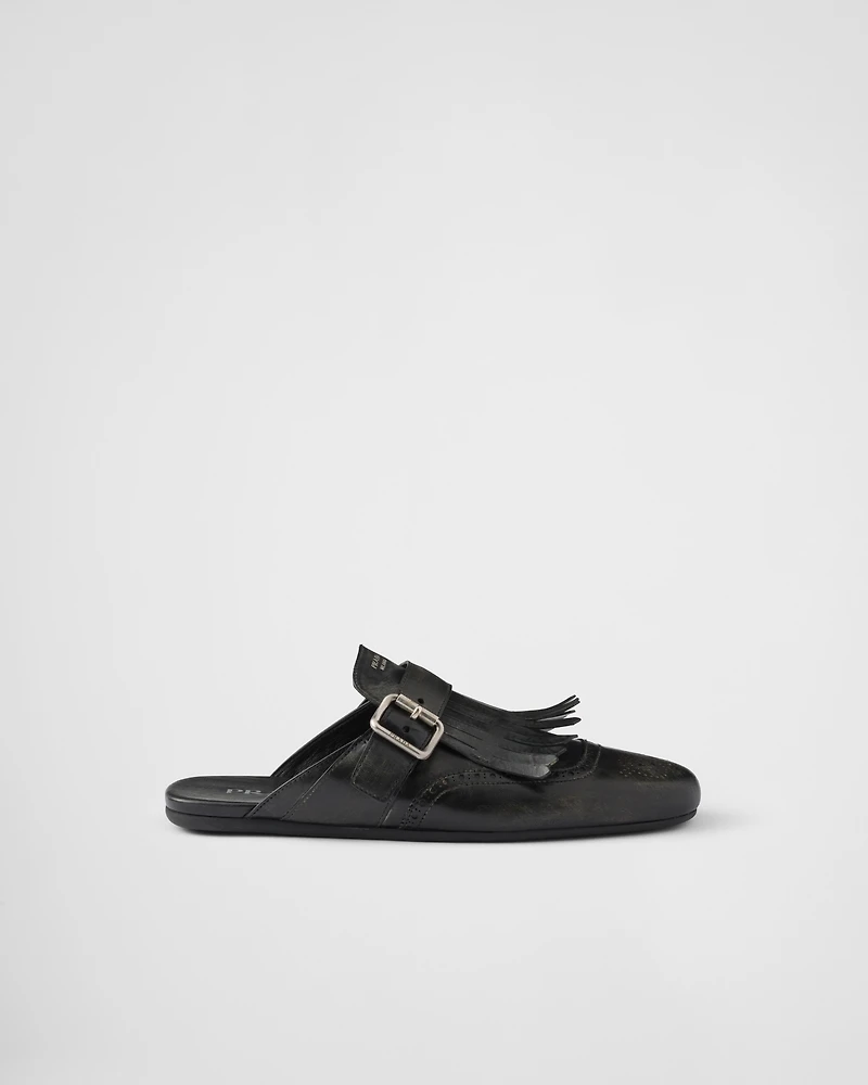 Shuffle fringed leather mules