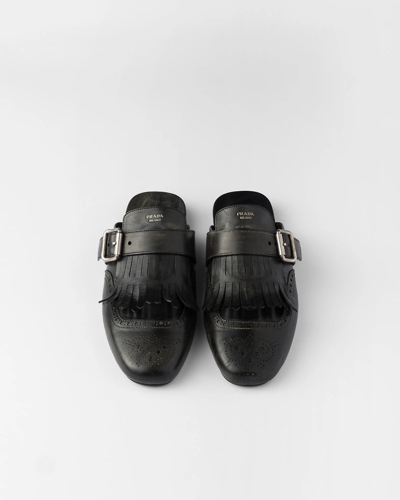 Shuffle fringed leather mules
