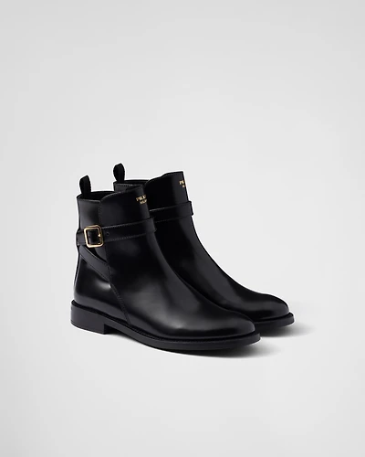 Brushed leather ankle boots with strap