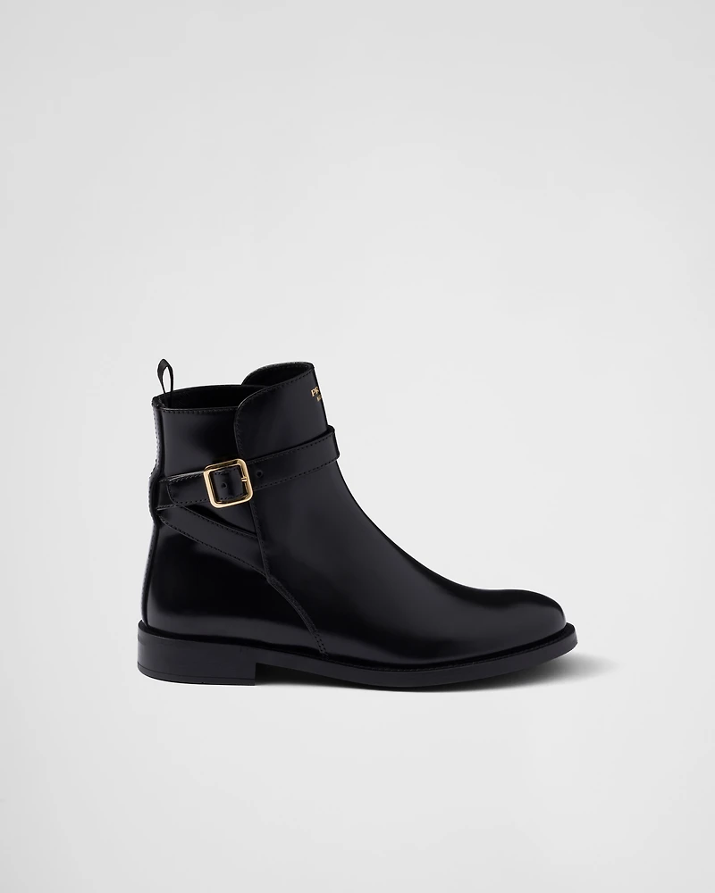 Brushed leather ankle boots with strap