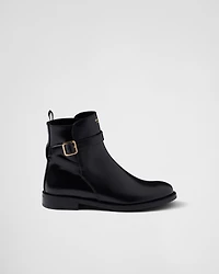 Brushed leather ankle boots with strap