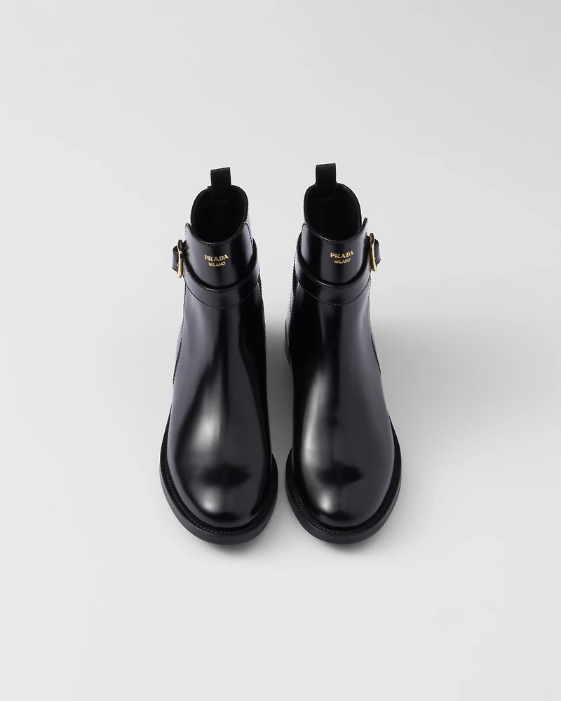 Brushed leather ankle boots with strap