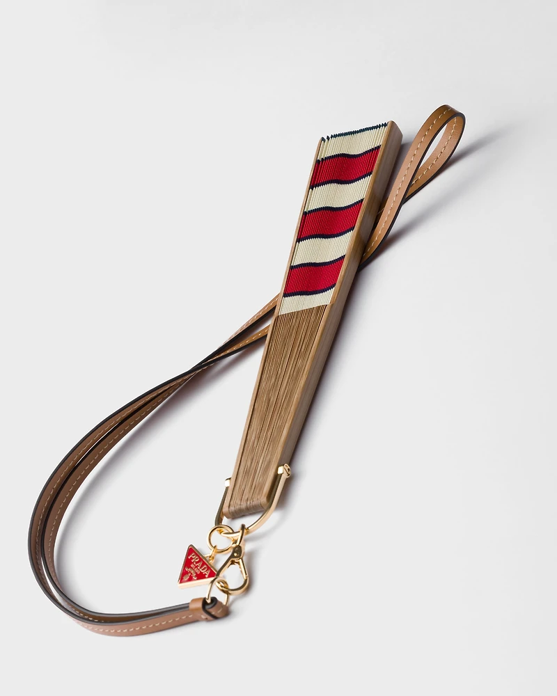 Fan with leather strap