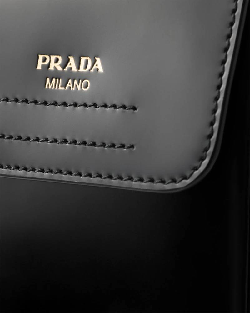 Brushed leather boots with pouch