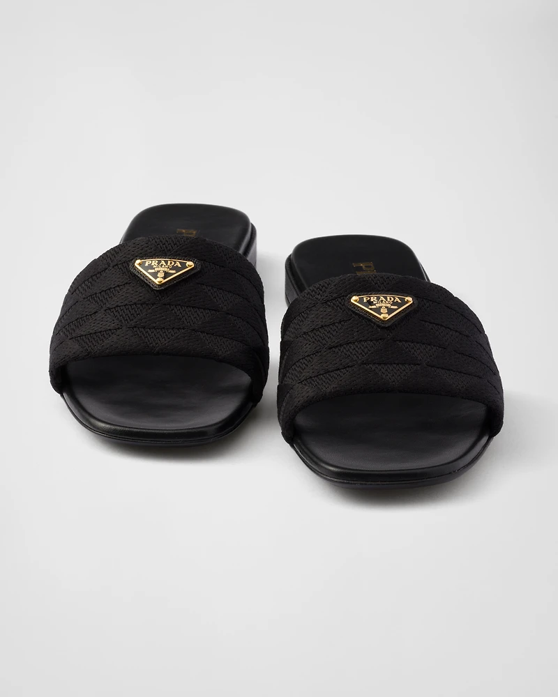 Embroidered fabric slides