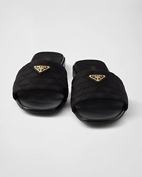 Embroidered fabric slides