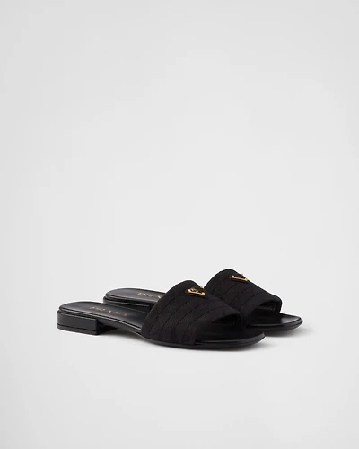 Embroidered fabric slides