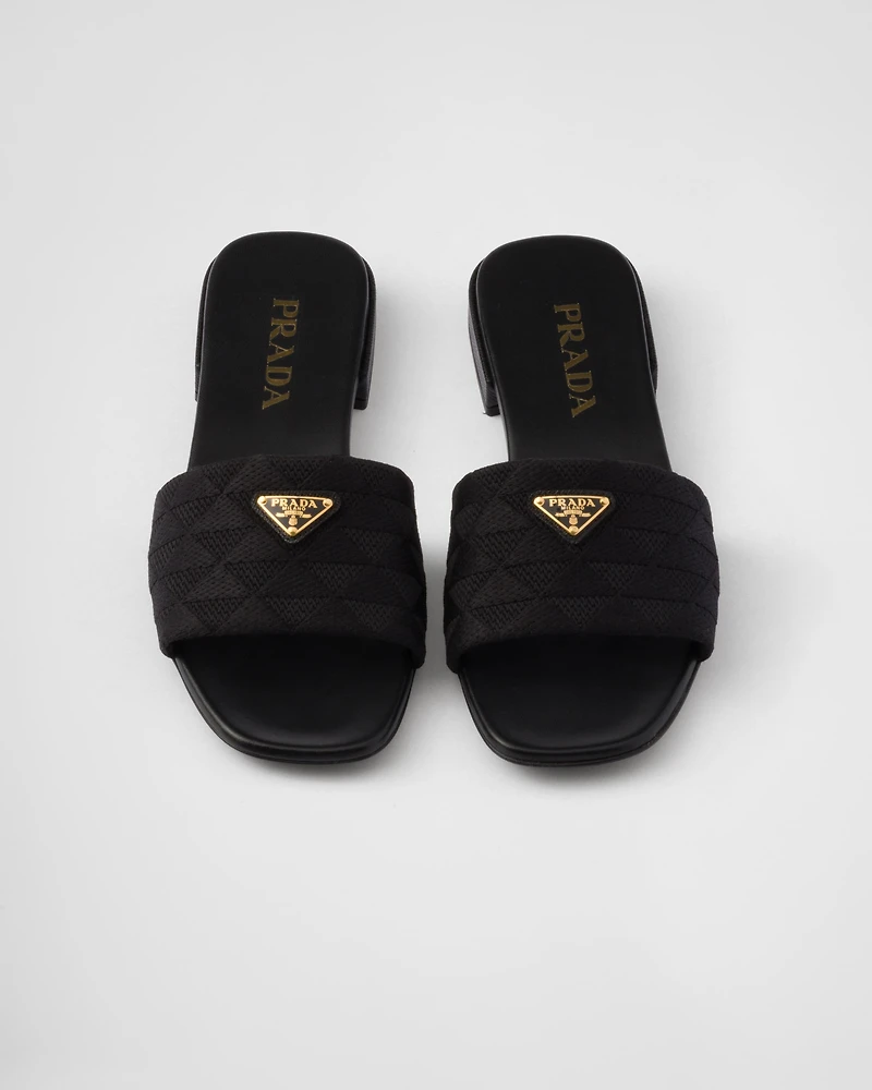 Embroidered fabric slides