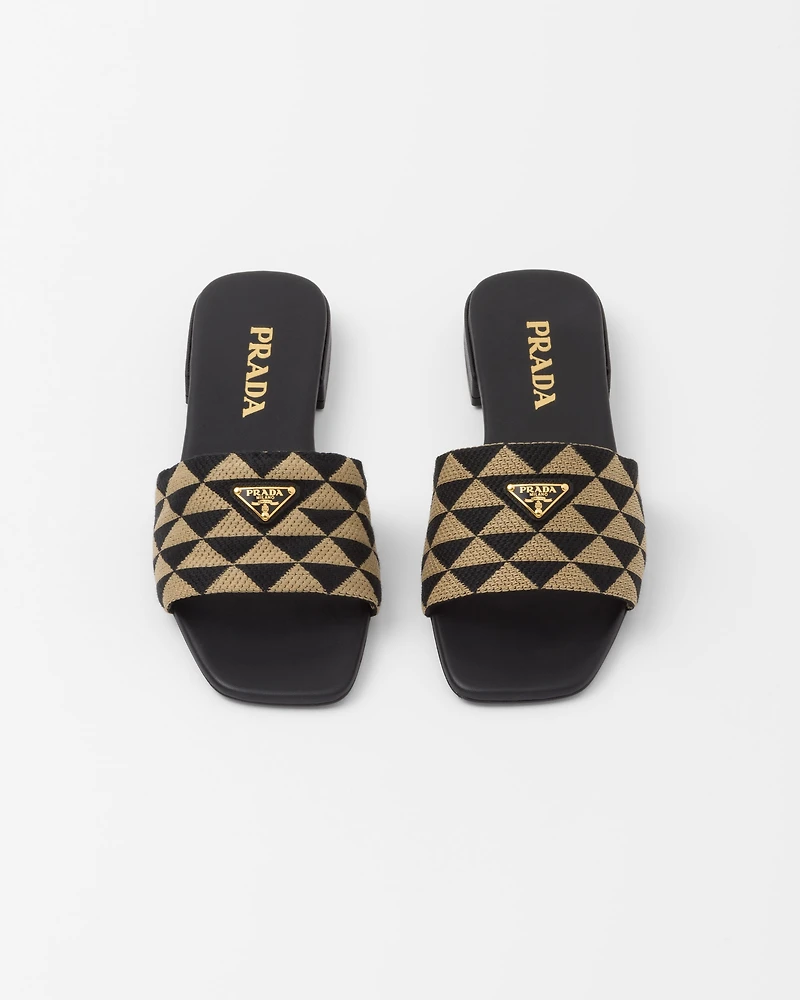 Embroidered fabric slides