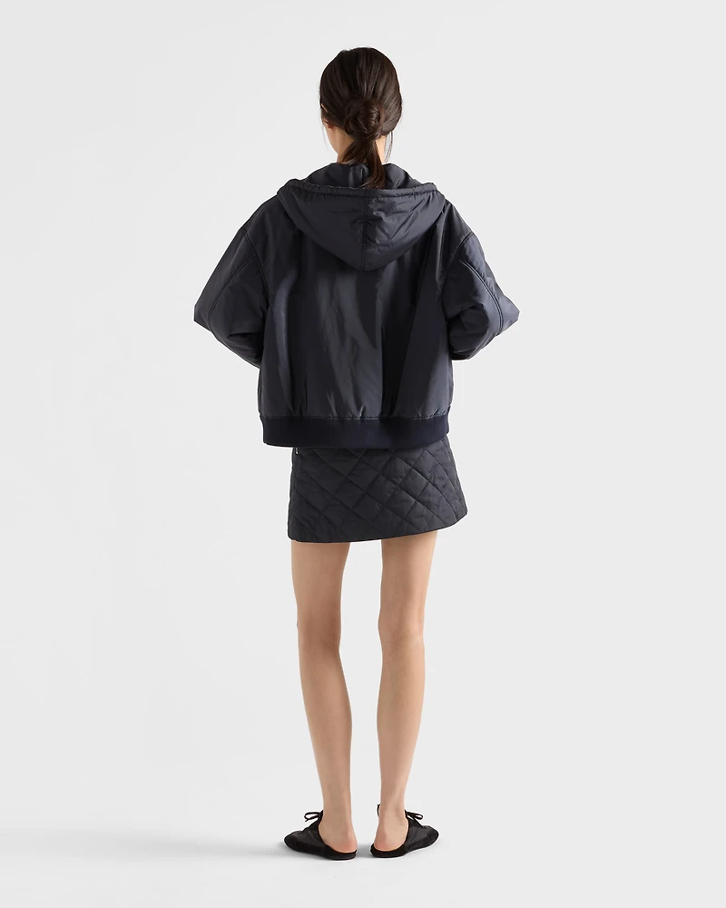 Lightweight, quilted Re-Nylon miniskirt