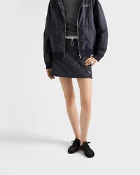 Lightweight, quilted Re-Nylon miniskirt