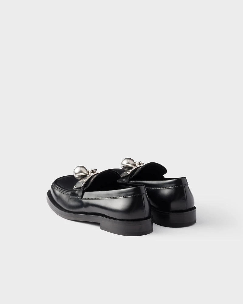 Brushed leather loafers with metal ring