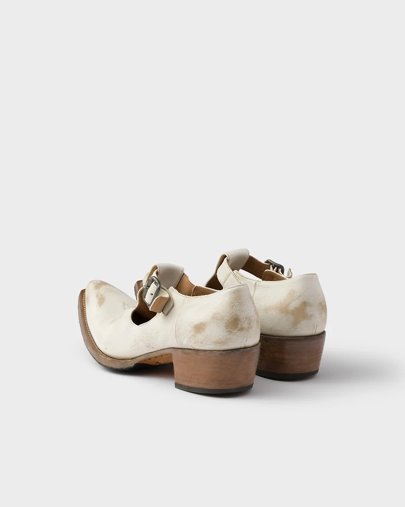 Antiqued leather shoes with buckle