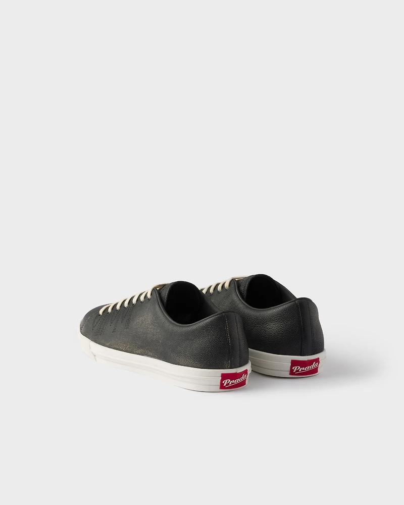 Aged-effect leather sneakers