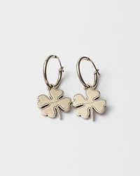 Metal hoop earrings with charm