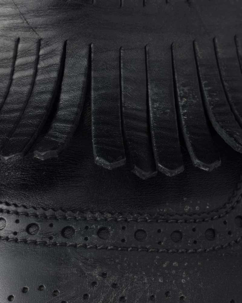 Shuffle fringed monk strap leather mules