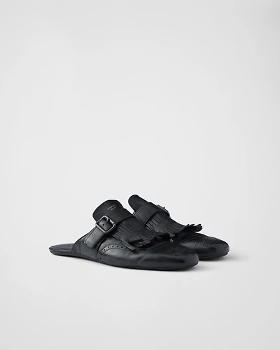 Shuffle fringed monk strap leather mules