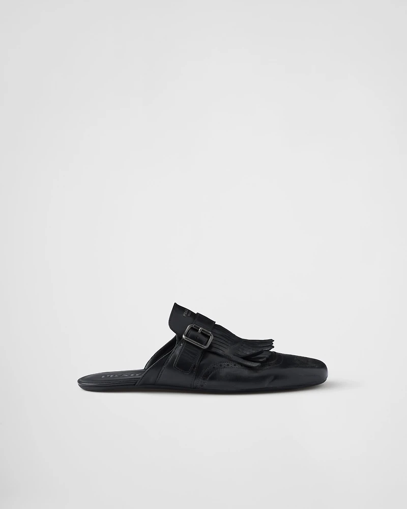 Shuffle fringed monk strap leather mules