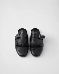 Shuffle fringed monk strap leather mules